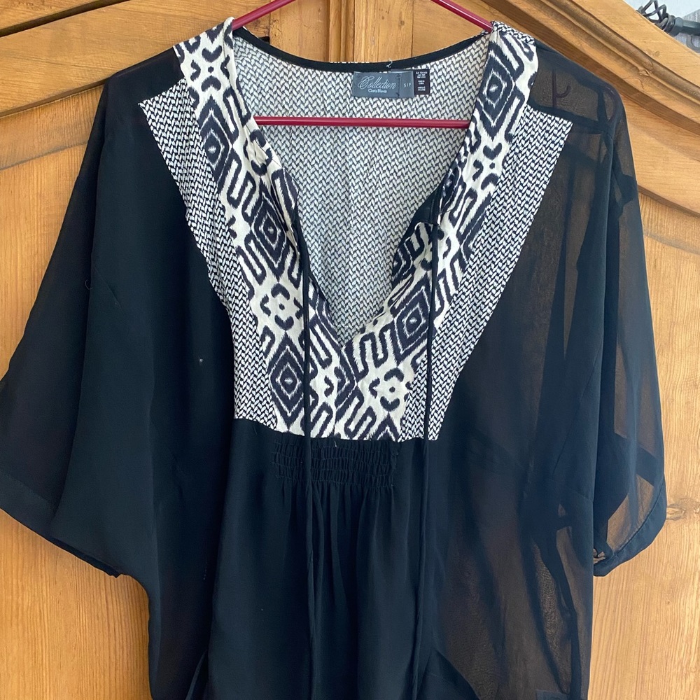Costa Blanca semi sheer flowy top